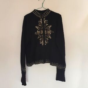 Icelandic Design zip up knit sweater. W/ sequine highlights.